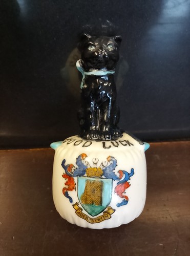 Crested china black cat on - ,
