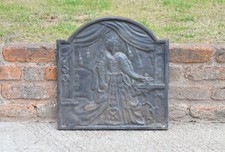 old cast iron fire back iron