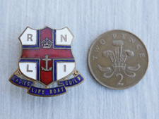 A Royal National Lifeboat Institution RNLI Ladies Life Boat Guild brass badge