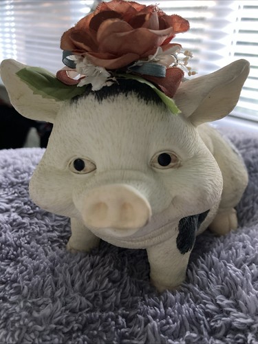 Pig ornament with faux - pig,