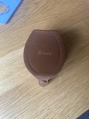 Vintage horseshoe shaped tan