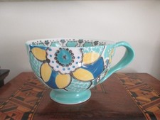 Anthropologie Elka Ayaka green mix floral footed pedestal twisted handle mug