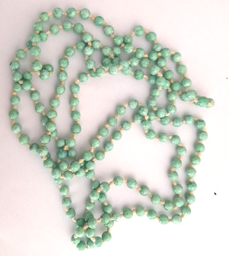 Vintage long strand - strand, carved