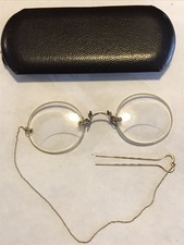 Antique Ladies pinch nose