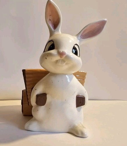 White bunny pulling brown - white, a