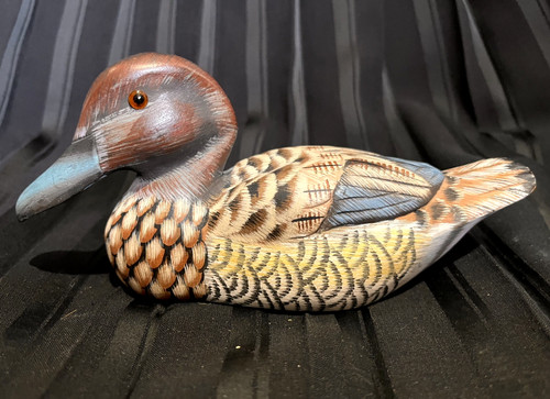 Hand carved and painted - hand,
