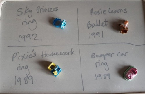 Polly pocket rings and toppers - and,