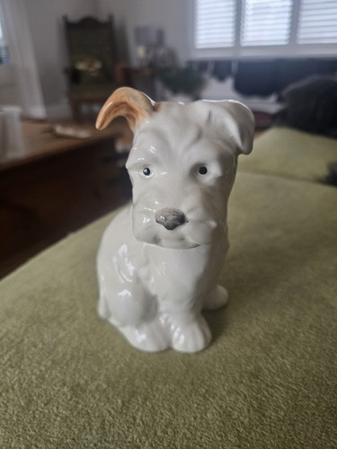 Early beswick puppy seated - seated,