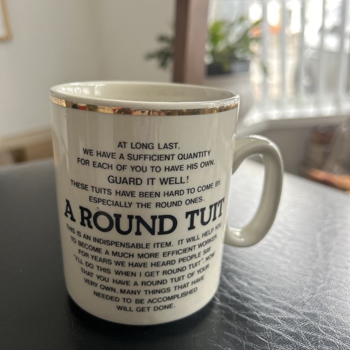 Funny novelty round tuit - a,