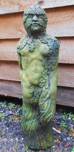 Green man statue stone garden - green,