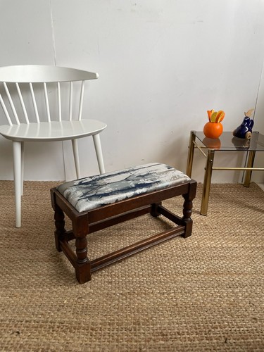 Chunky dark wooden footstool