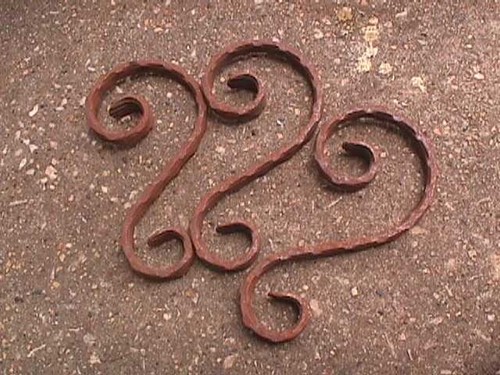Rusty wrought iron decorative - rusty,