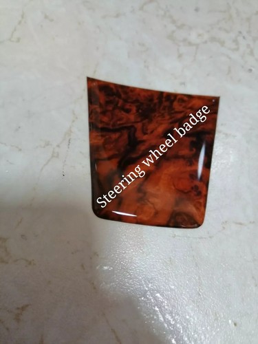 Steering wheel gel badge cover