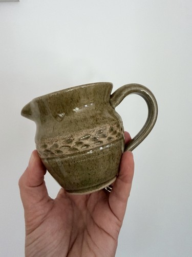 Studio pottery jug features - , a