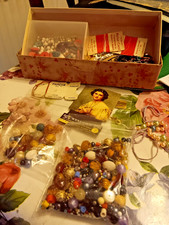 OLD BOX FULL OF BEADS AND