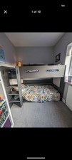 Black bunk beds with shelves