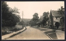 Postcard Broadway, Street view with houses and telephone poles 