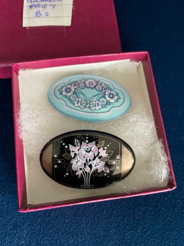 Two micheal frey brooches - two,