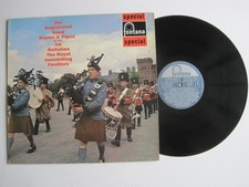 THE REGIMENTAL BAND DRUMS &