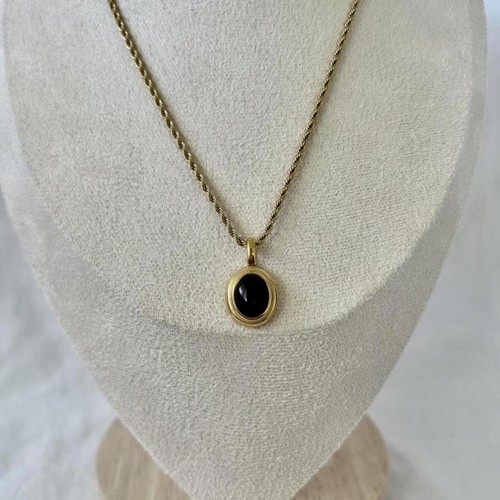 Gold plated jet black gemstone