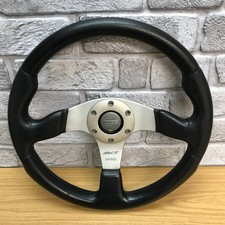 Genuine Momo Race black leather, 3 spoke, 350mm steering wheel. Dated 1994.   8C