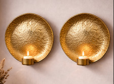 Golden candle sconces wall