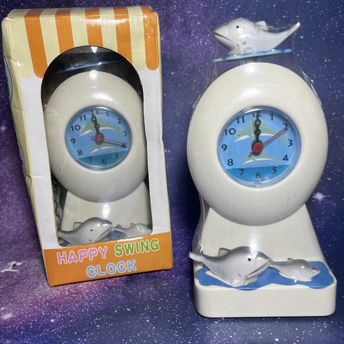 Nos moving dolphin clock - moving,