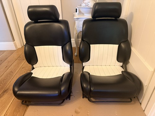 Reupholstered front seats - reupholstered,