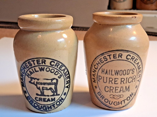Two antique cream - two, pots
