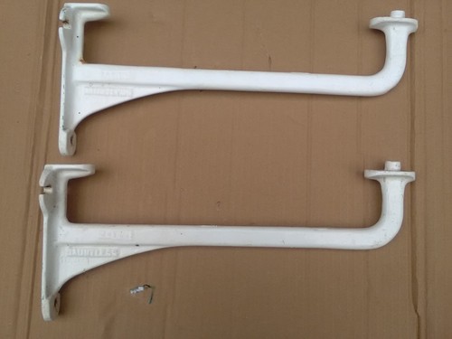 Pair dauntless cast iron - a, of
