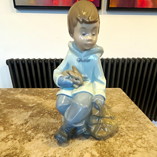 Nao porcelain seated boy - seated,