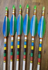 A set of six handmade wooden