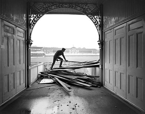 Demolition squads tear down