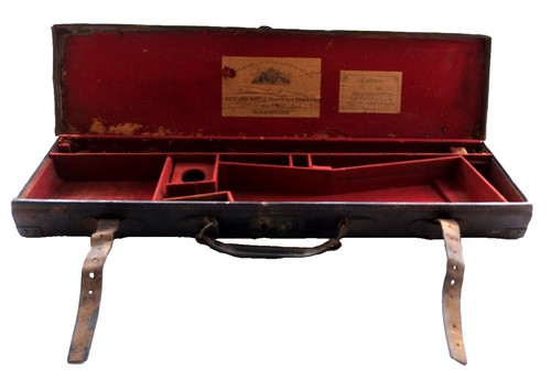 Brass mounted leather gun - leather,
