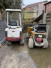 Takeuchi Digger And Mini