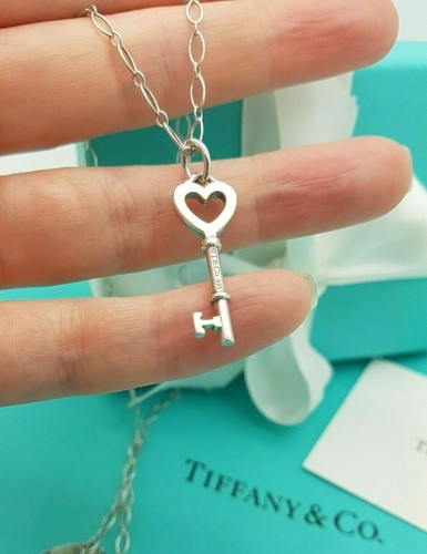 Tiffany open heart key - &,