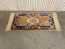 A Chinese wool rug of blue