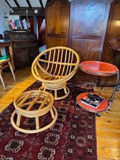 swivel egg armchair and a