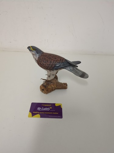 Wooden carved peregrine falcon - wooden,