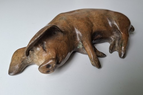 Slumbering bronze pig by - slumbering,