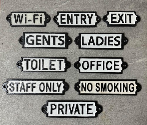 Door signs toilet - door,