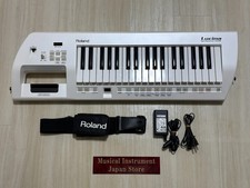Roland AX-09 Lucina 37-Key Keytar Shoulder Keyboard Synthesizer with Power Cable