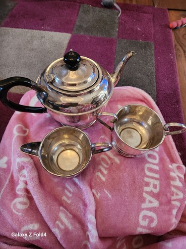 Three piece silver plate - piece,