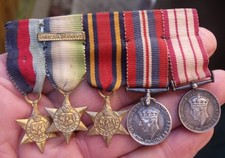 A PERIOD WW2 ROYAL NAVY MINIATURE MEDAL GROUP, RN GSM.