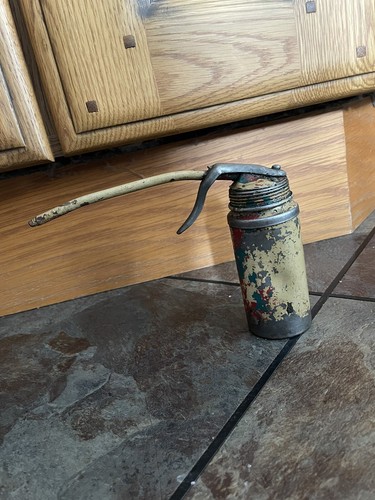 Old oil can - oil,