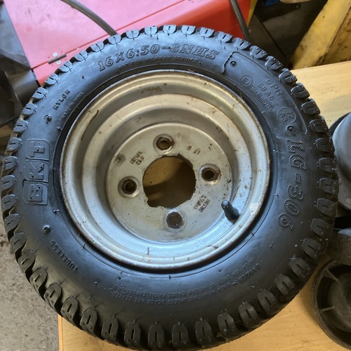 Ride mower wheel tyre - on,