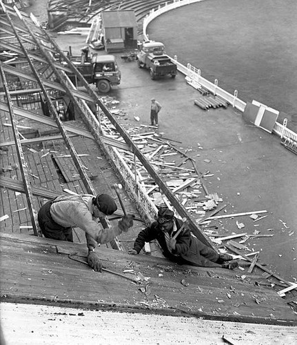 Demolition squads tear down
