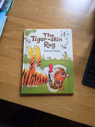 The tiger skin rug gerald - rug,