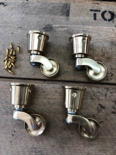 Polished brass vintage castors - vintage,