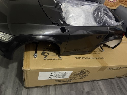 Unassembled black ride car - ride-on,